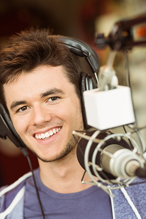 Student recording in a radio station